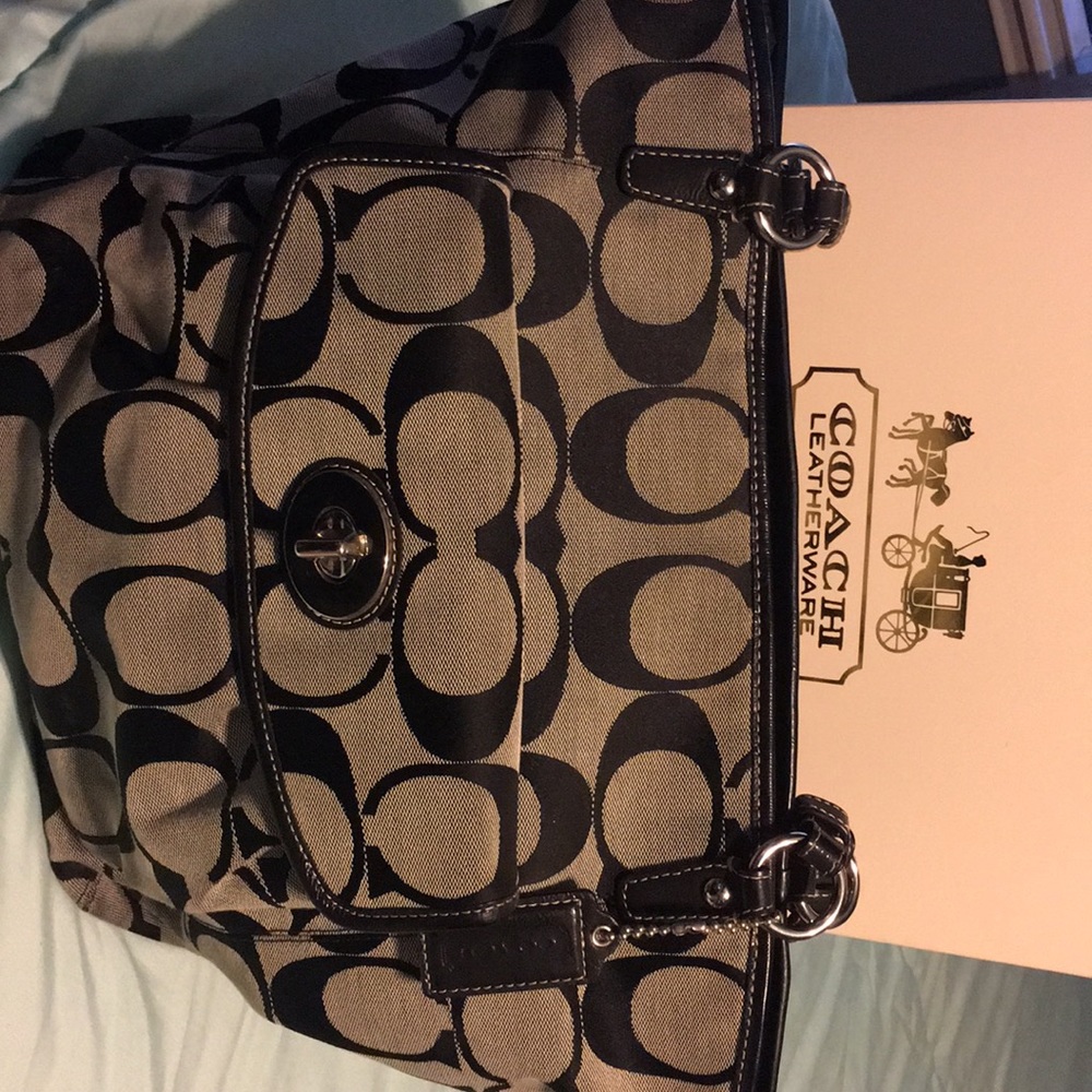 Coach Signature Shoulder Bag.